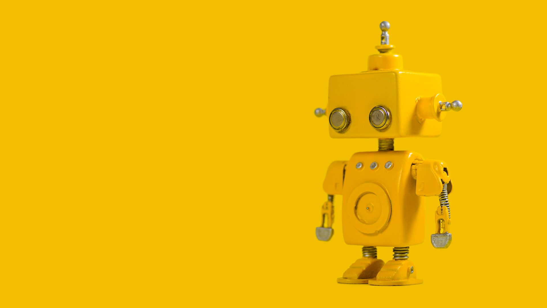 Gelber Roboter auf gelben Hintergrund